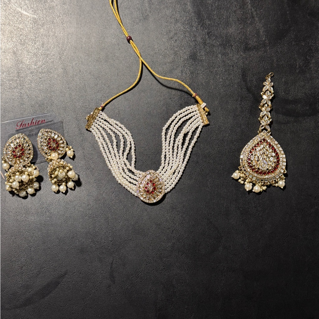 The Choker Set Consists Of Earrings And Mang Tikka